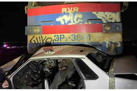 Train and car collide: two killed 